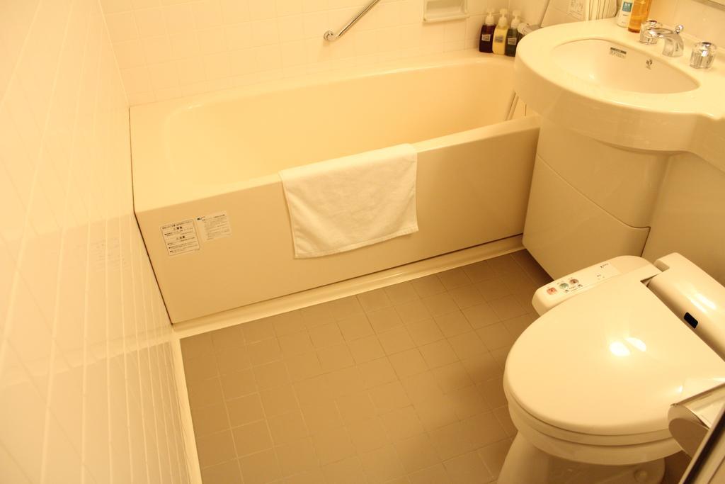 Hotel Saika Fujisawa Quarto foto